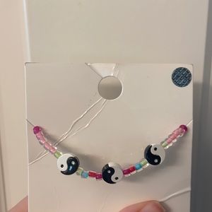 Urban outfitters smiley bracket